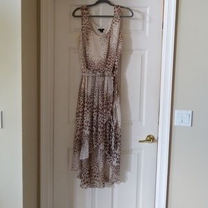JBS sleeveless animal print dress with hi low hem.